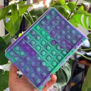 Popit pop bubble kids children's toy blue purple green notebook drawing activity